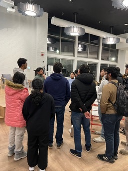 Students asking questions during a startup clinic